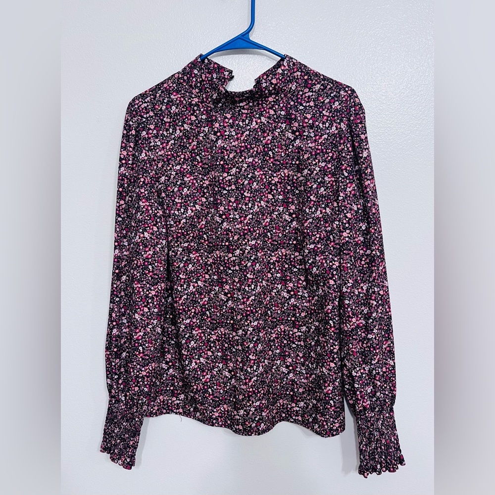 Colorful, long sleeved top